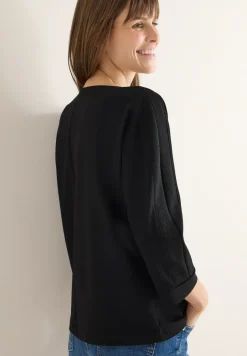 Batwing shirt met tape