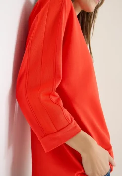 Batwing shirt met tape