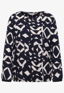 Bedrukte blouse met getapete manchetten