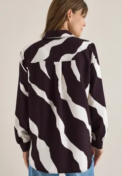 Bedrukte blouse met getapete manchetten