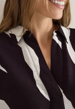 Bedrukte blouse met getapete manchetten