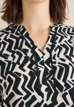 Bedrukte blouse met tape