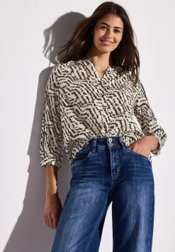 Bedrukte blouse met taping details