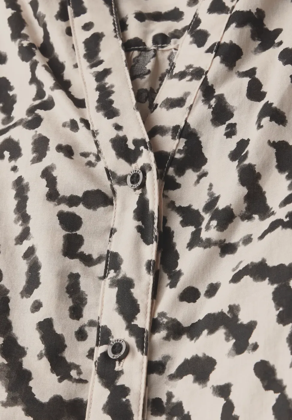 Bedrukte blouse met taping details