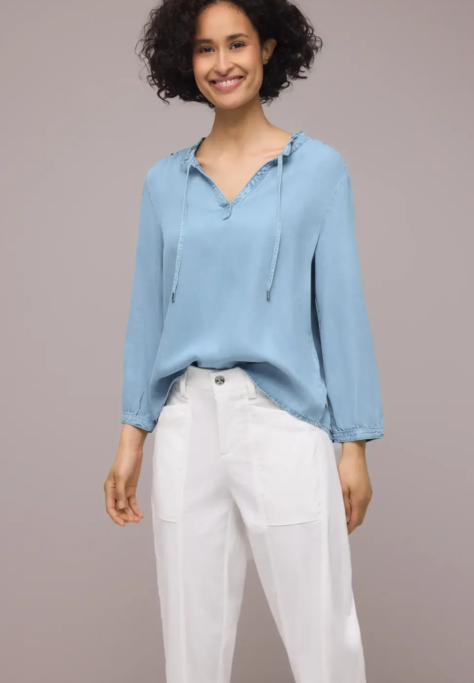 Blouse met 3/4 mouwen en gespleten hals in denimlook