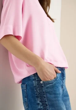 Blouse met gespleten hals en elastische zoom