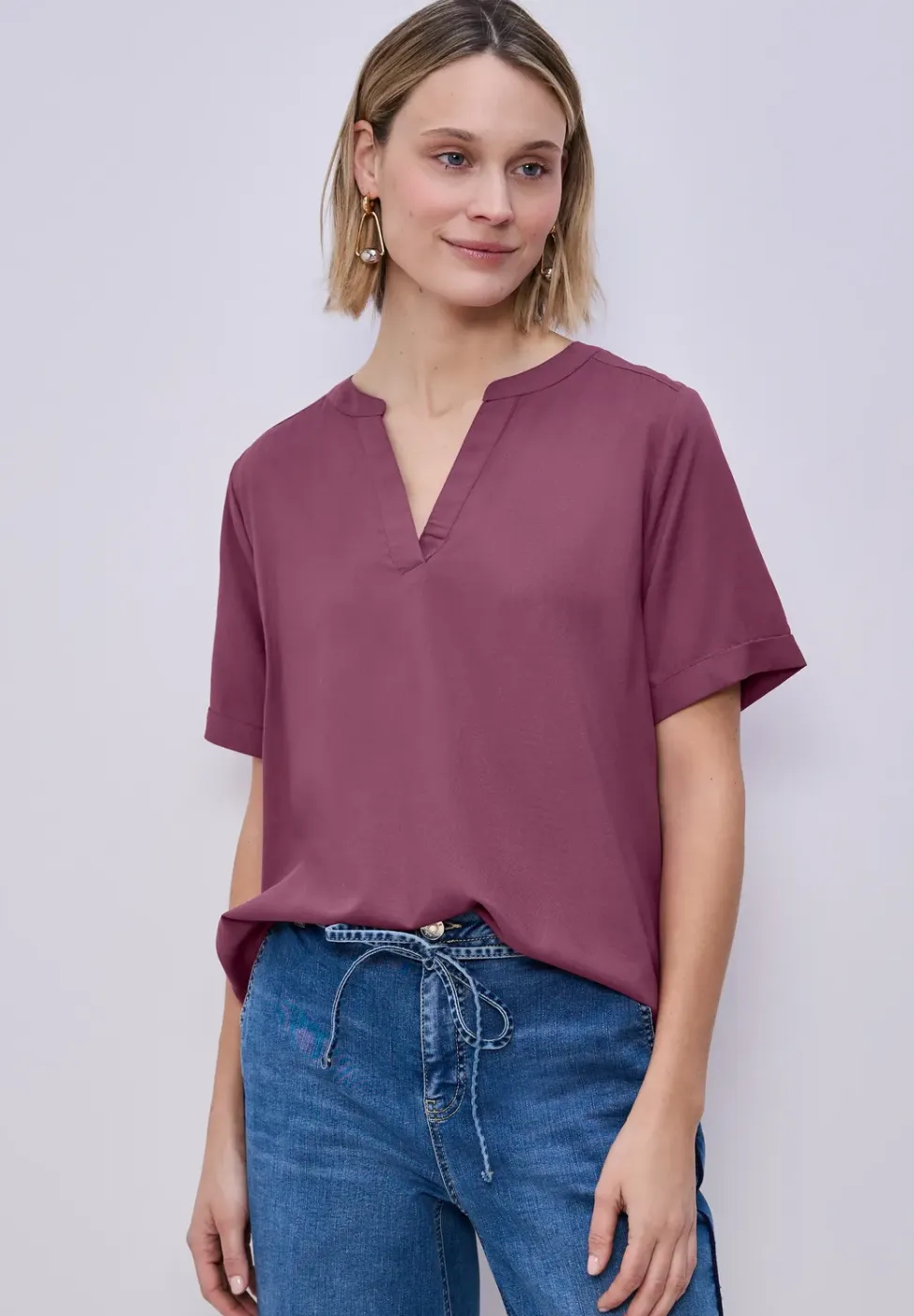 Blouse met gespleten hals en omslag