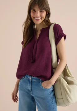 Blouse met gespleten hals in mousseline