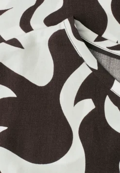 Blouse met hangende schouder en print