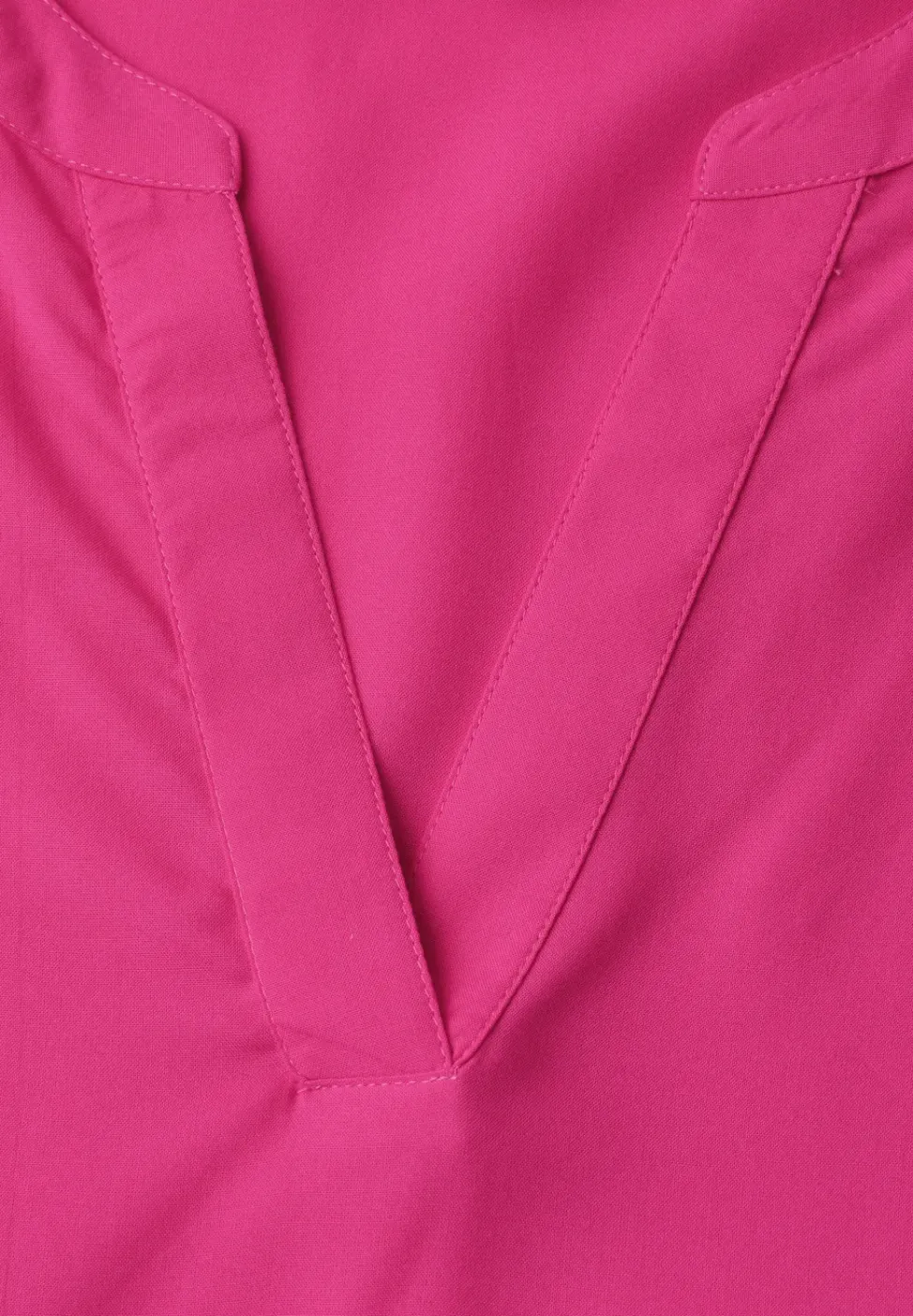 Blouse met korte mouwen en gespleten hals in effen kleur