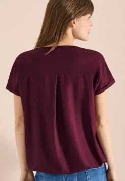 Blouse met korte mouwen en gespleten hals