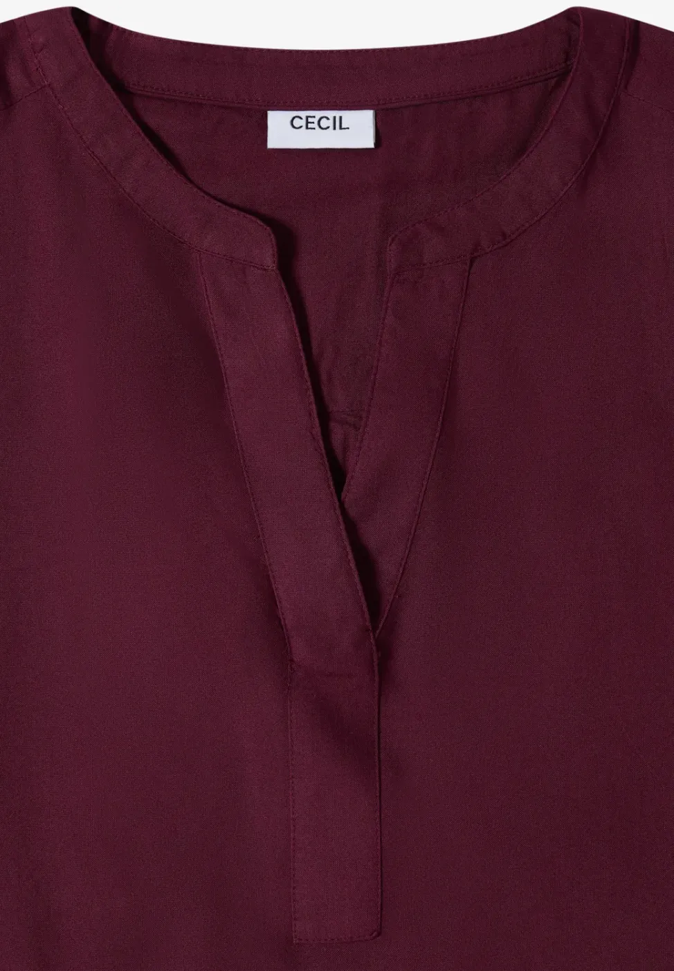 Blouse met korte mouwen en gespleten hals