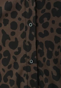 Blouse met overhangende schouders en bowlingkraag