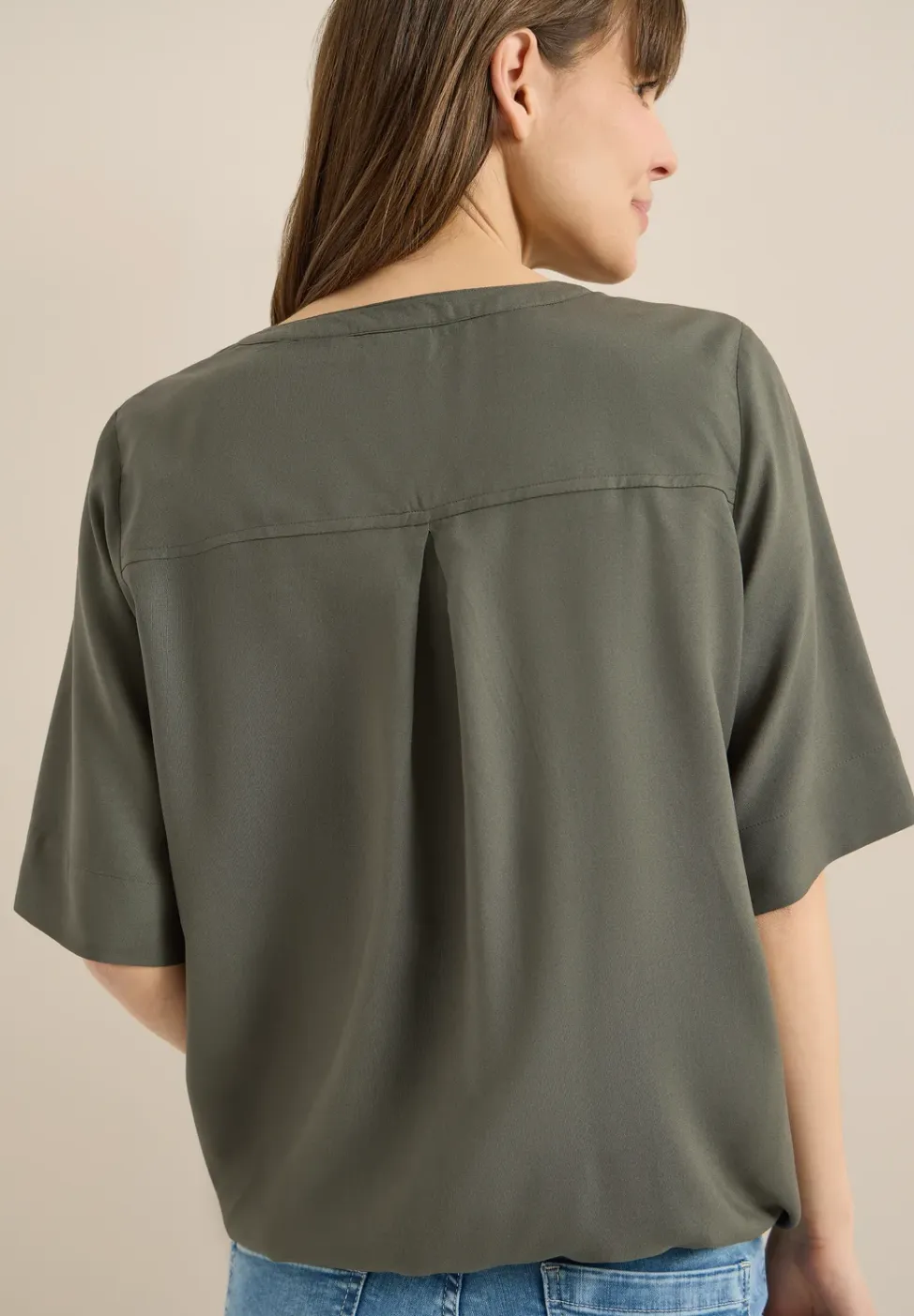 Blouse met gespleten hals en elastische zoom