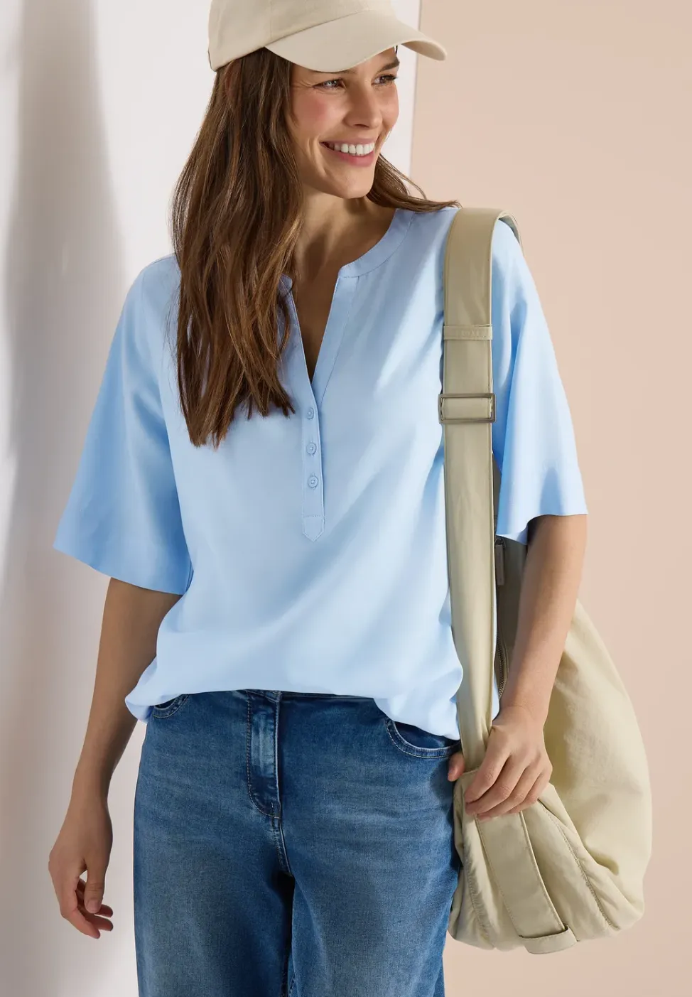Blouse met gespleten hals en elastische zoom