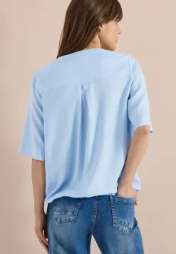 Blouse met gespleten hals en elastische zoom