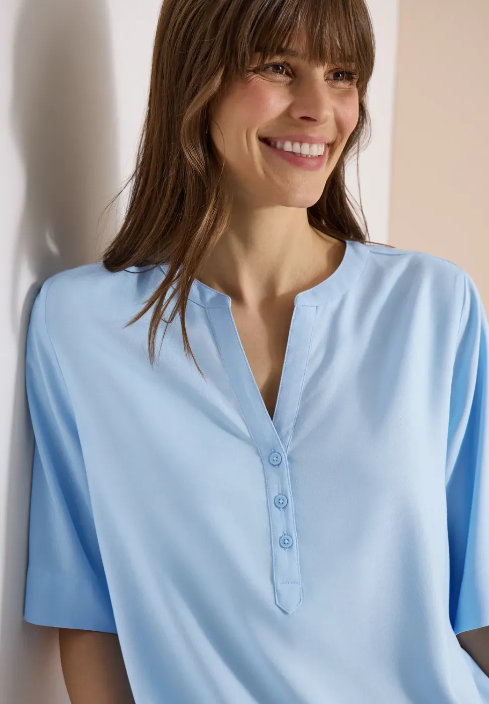 Blouse met gespleten hals en elastische zoom
