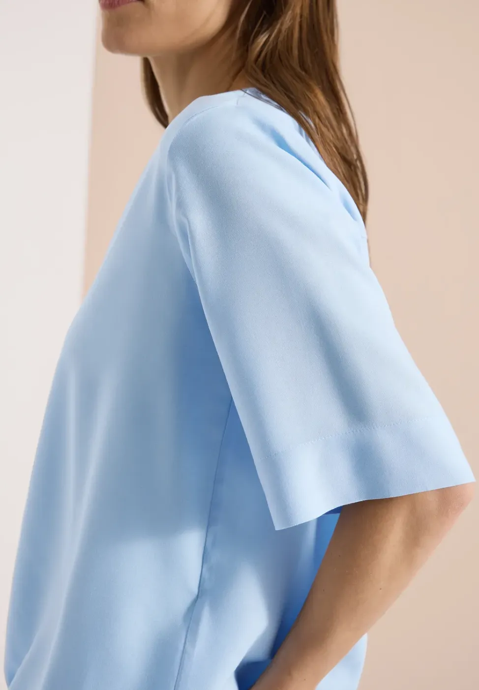 Blouse met gespleten hals en elastische zoom