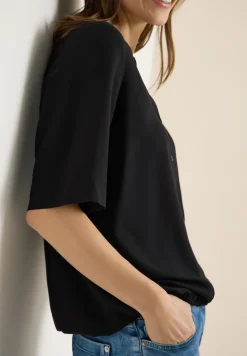 Blouse met gespleten hals en elastische zoom