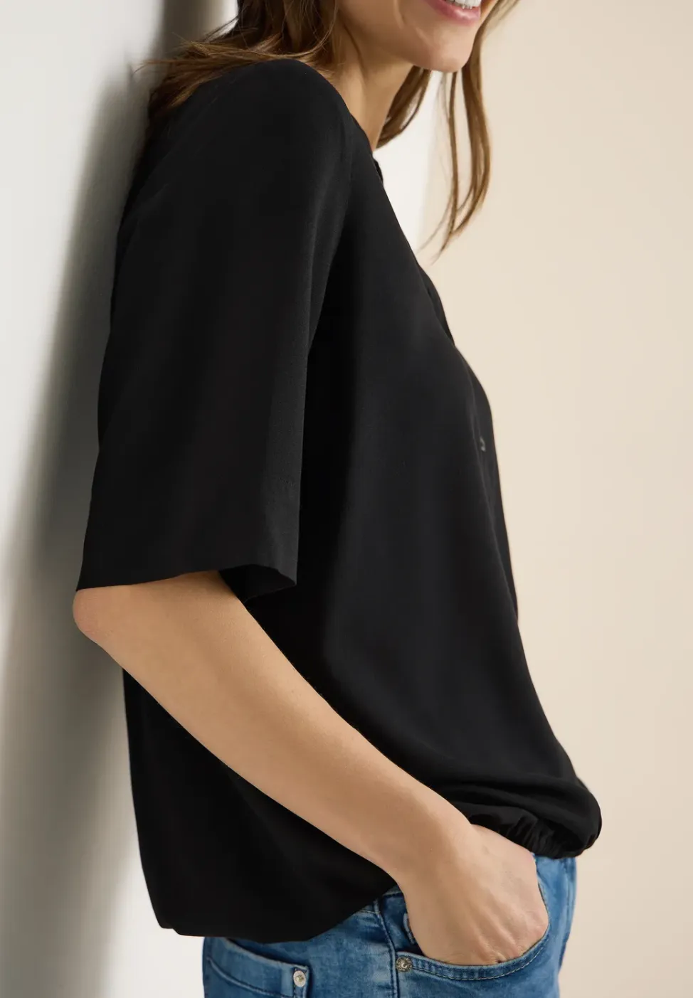 Blouse met gespleten hals en elastische zoom