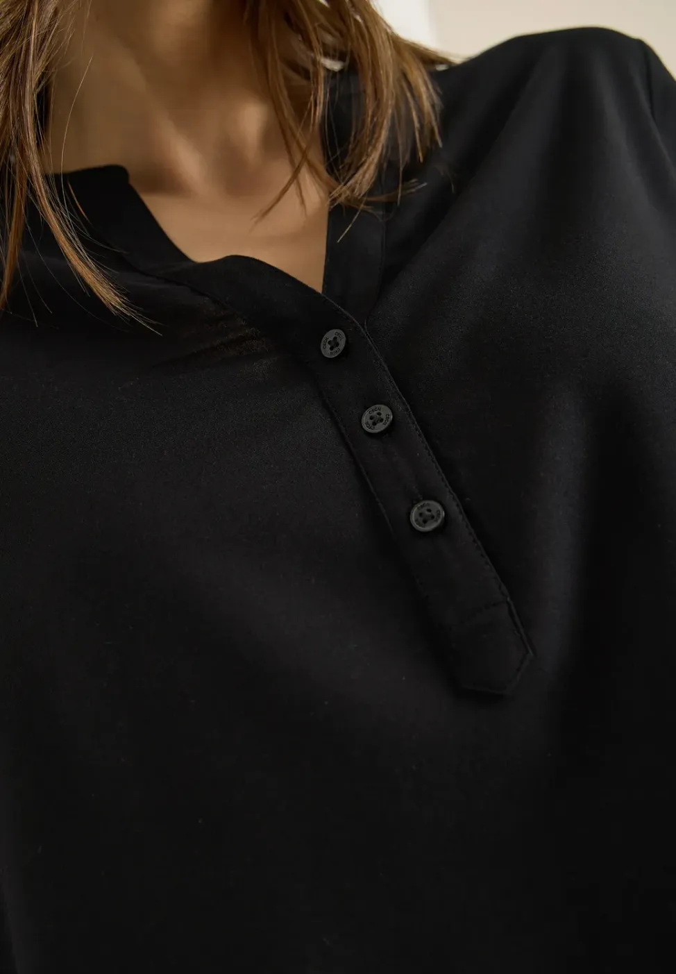 Blouse met gespleten hals en elastische zoom