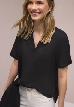 Blouse met gespleten hals en omslag