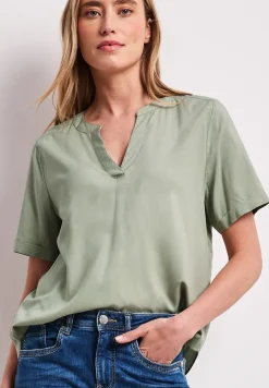 Blouse met gespleten hals en omslag