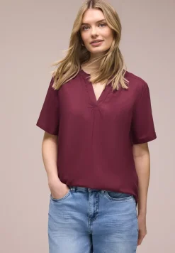 Blouse met gespleten hals en omslag