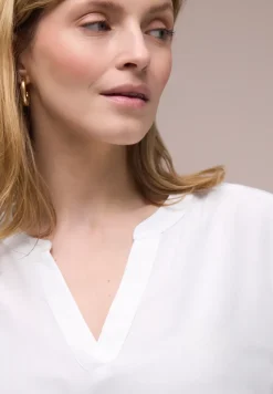 Blouse met gespleten hals en omslag