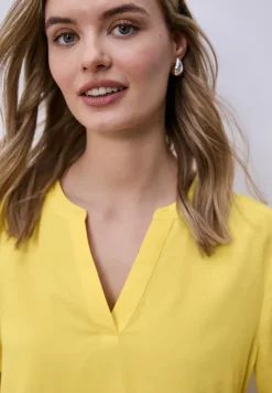 Blouse met gespleten hals en omslag