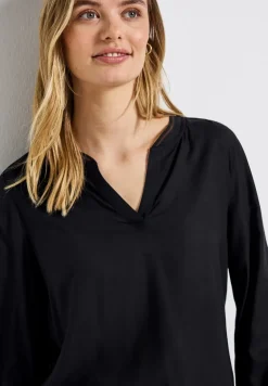 Blouse met gespleten hals en tape