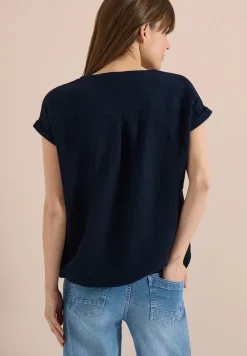 Blouse met gespleten hals in mousseline