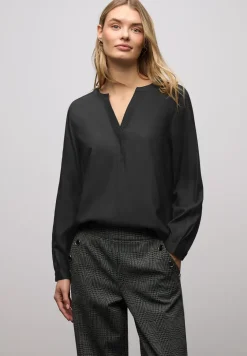 Blouse met glitterdetail