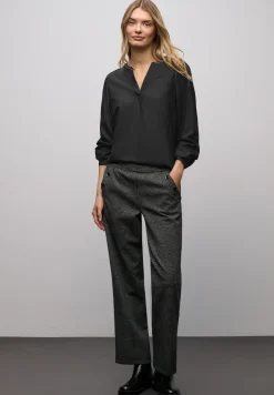 Blouse met glitterdetail