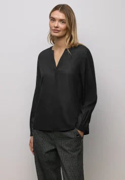 Blouse met glitterdetail