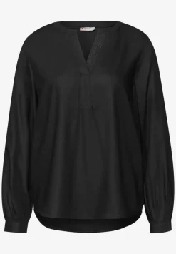 Blouse met glitterdetail