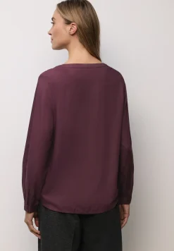 Blouse met glitterdetail