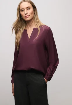 Blouse met glitterdetail