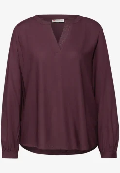 Blouse met glitterdetail