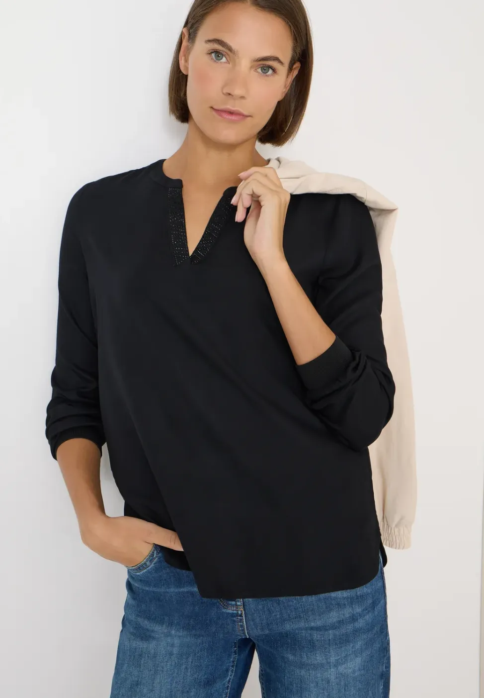 Blouse met glitterdetails