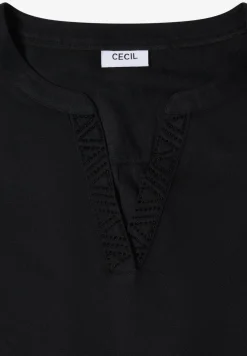 Blouse met glitterdetails