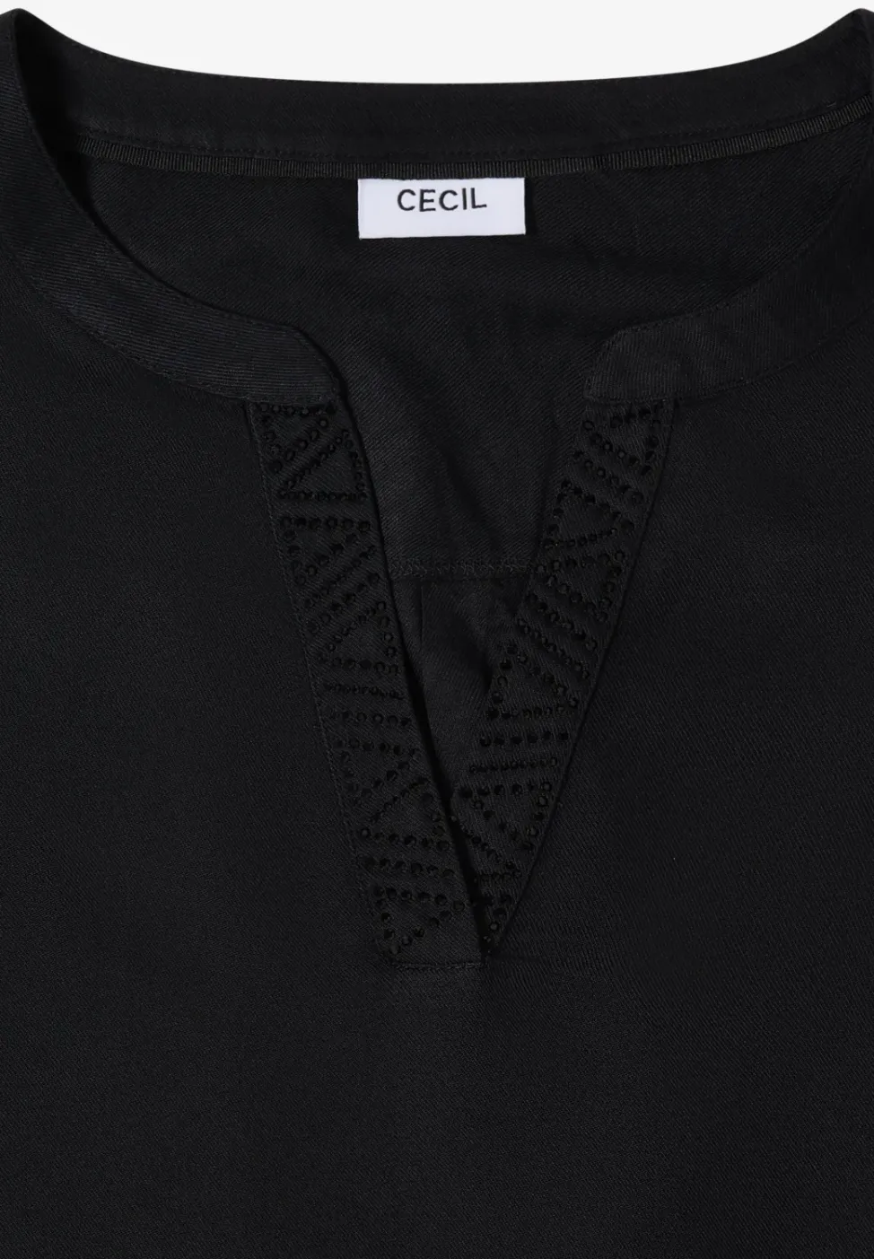 Blouse met glitterdetails