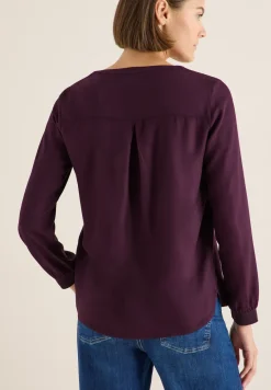 Blouse met glitterdetails