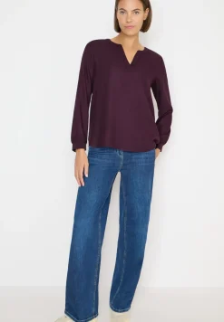 Blouse met glitterdetails