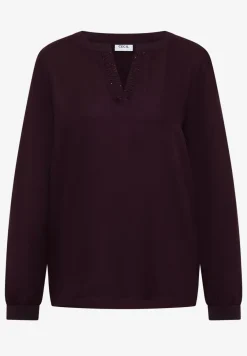 Blouse met glitterdetails
