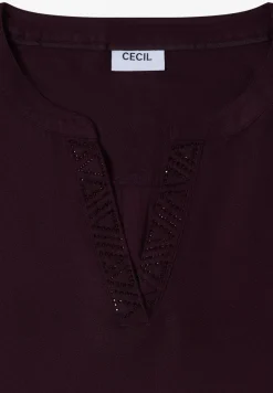 Blouse met glitterdetails