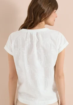 Blouse met hangende schouder en borduursel