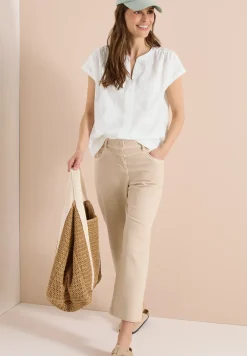 Blouse met hangende schouder en borduursel
