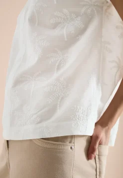 Blouse met hangende schouder en borduursel
