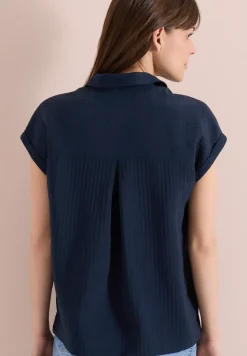 Blouse met hangende schouder en structuur